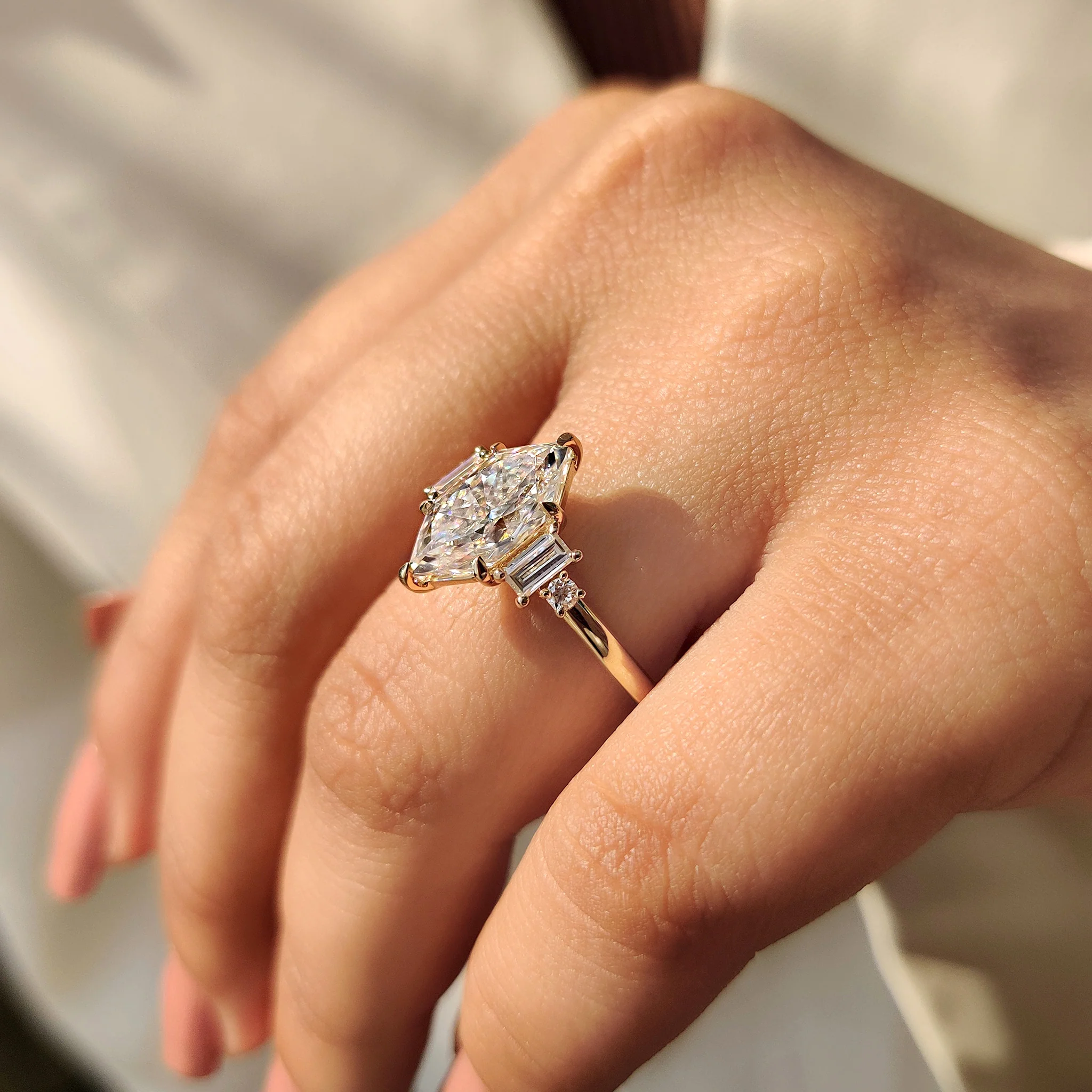 Dutch Marquise Moissanite Ring with Baguette Side Stone - Image 4