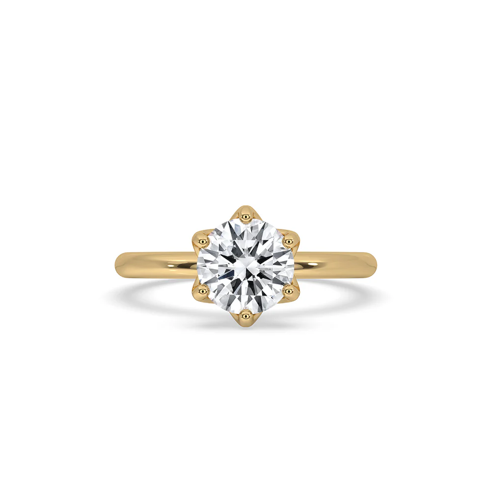 Gold Solitaire Engagement Ring With Round Diamond