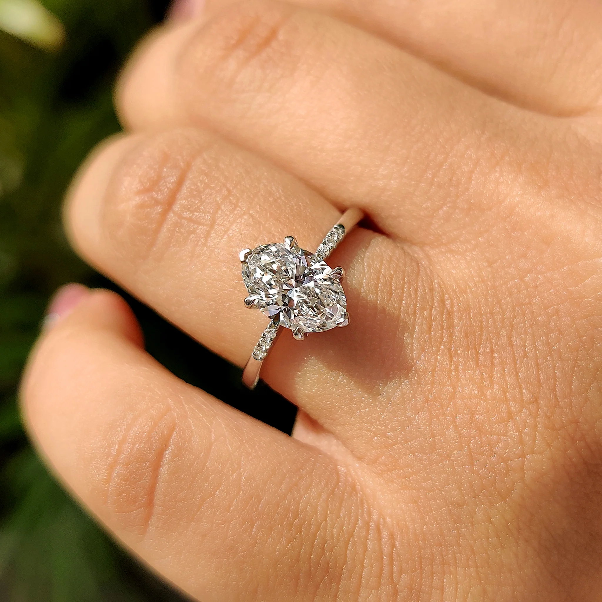 Oval Cut Diamond Engagement Ring With Pave Setting - Image 9