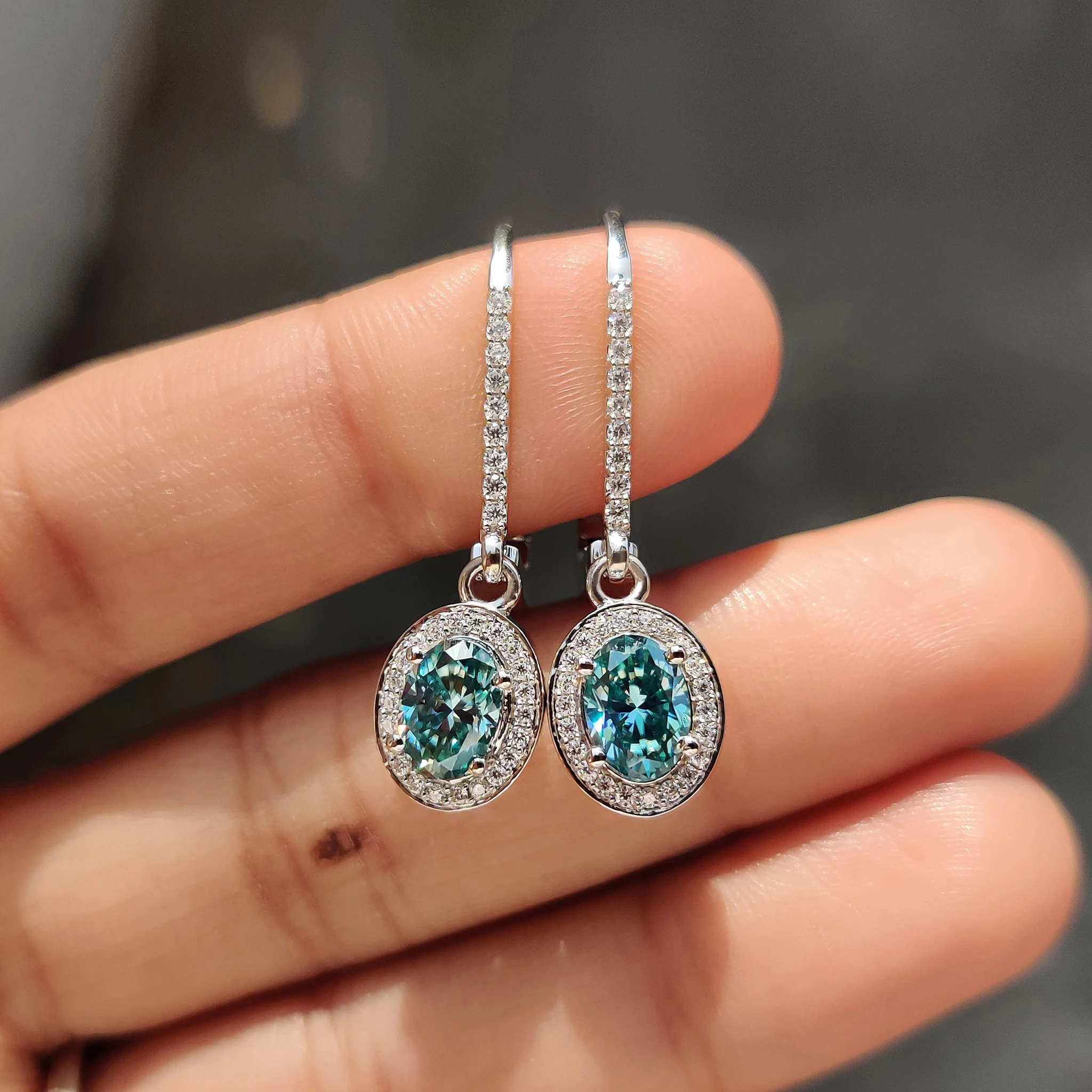 Oval Cut Earrings In Halo Style