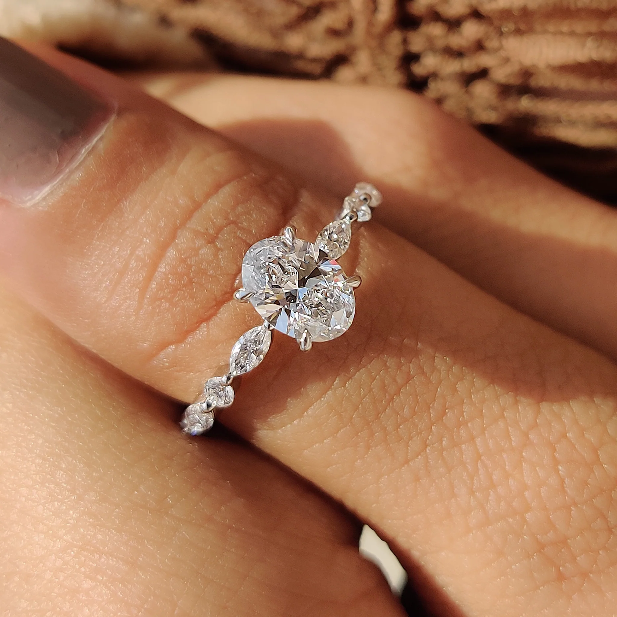 Oval Cut Engagement Ring With Round And Marquise Side Stones - Image 9