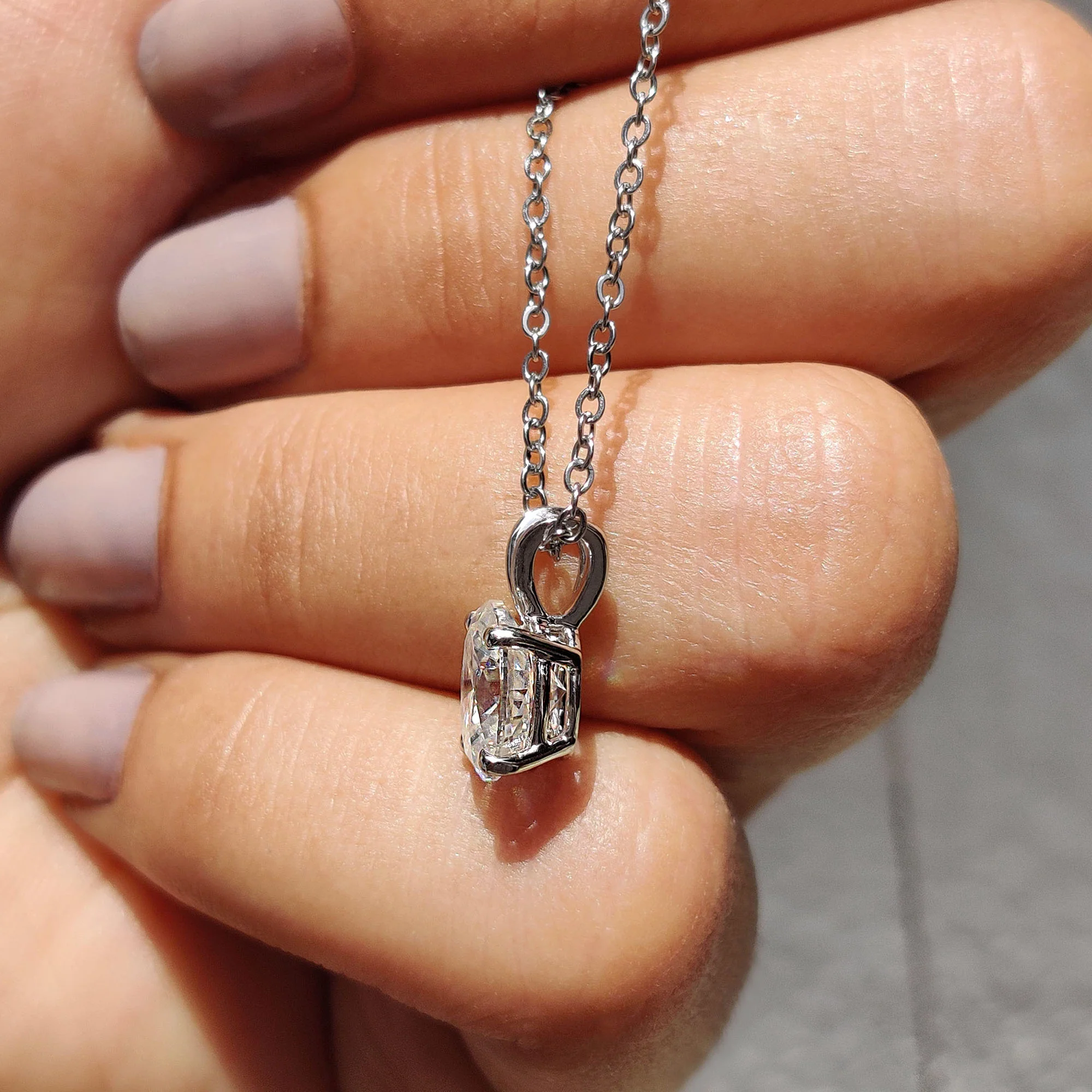 Oval Cut Moissanite Pendant In Solitaire Bunny Ear Bail - Image 3