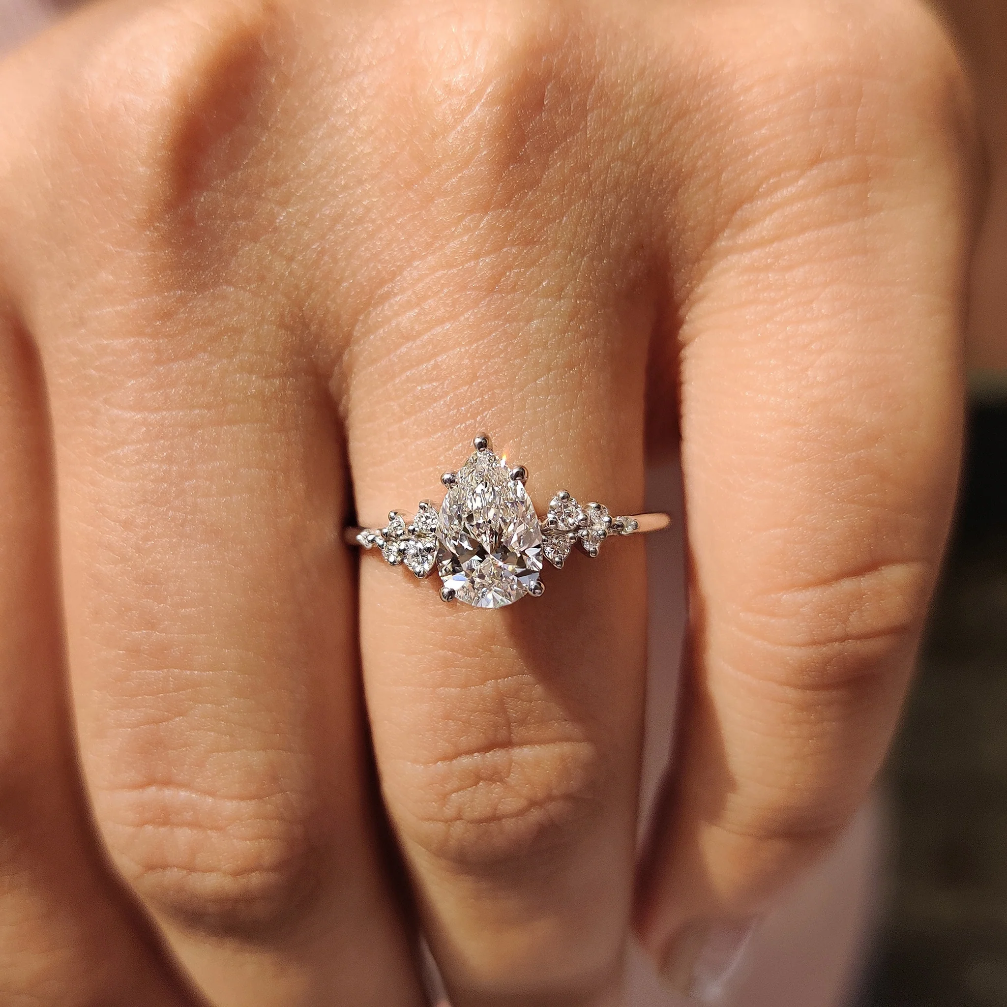 Pear Cluster Diamond Ring With Round Side Stone - Image 8