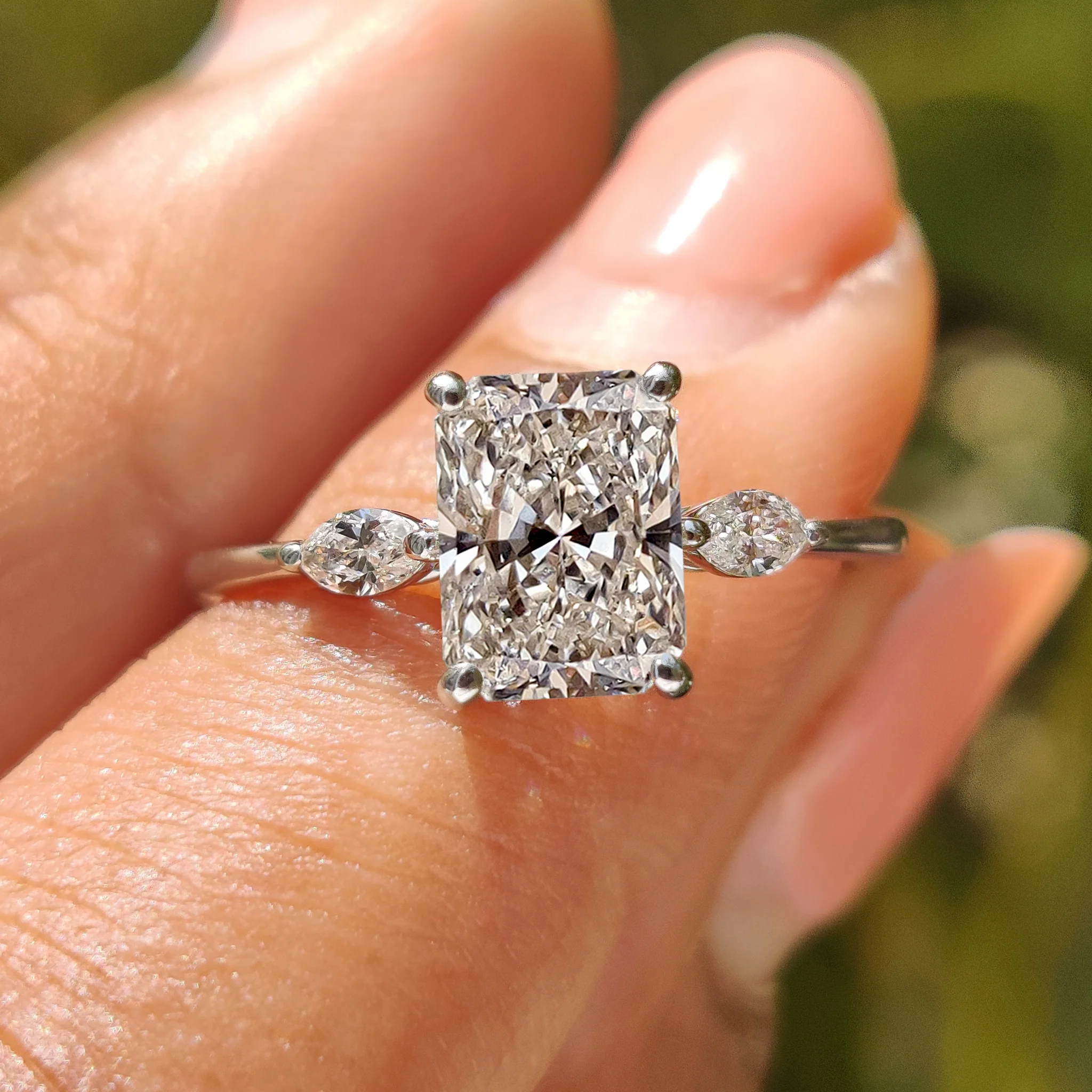 Radiant Cut Diamond Ring With Marquise Side Stone - Image 9
