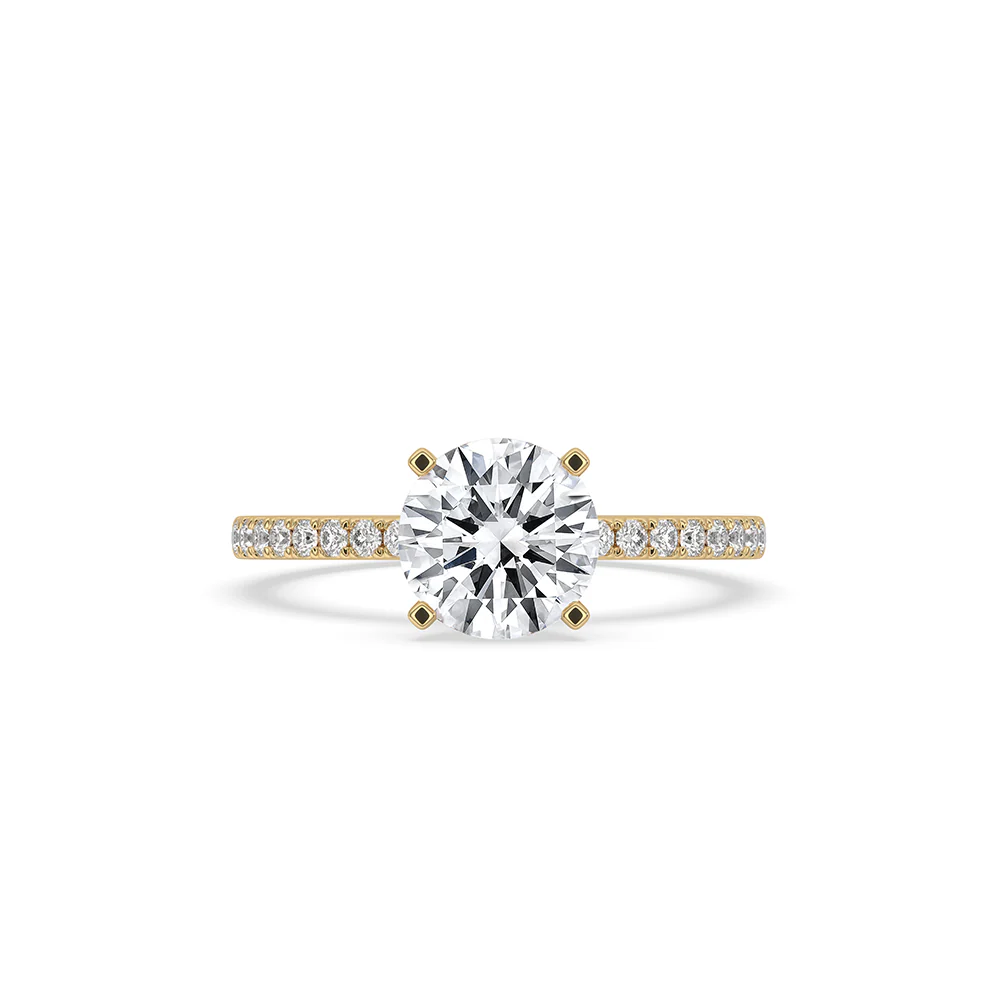 Round Cut Engagement Ring In Pave Setting