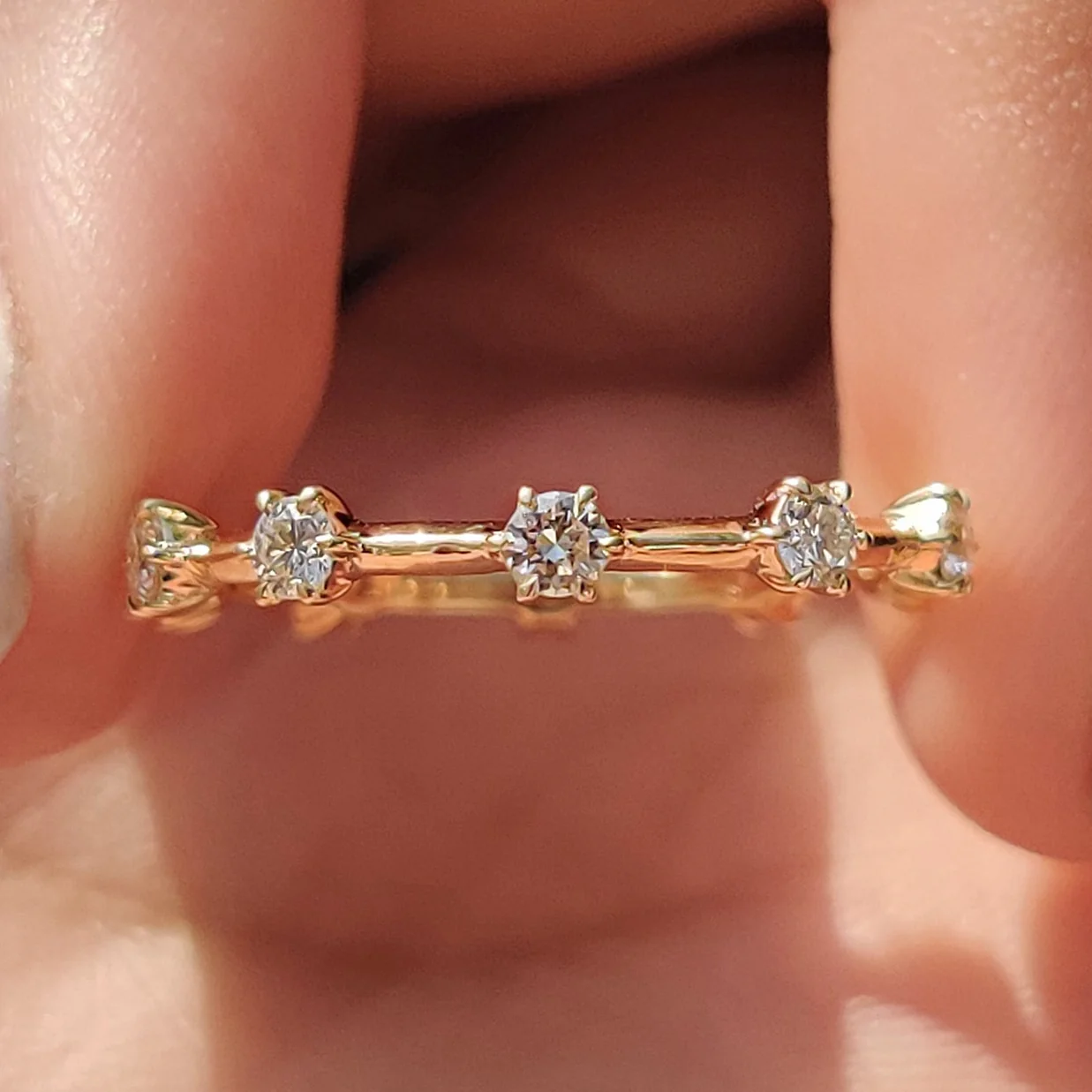 round cut wedding band In Distance Pave Setting