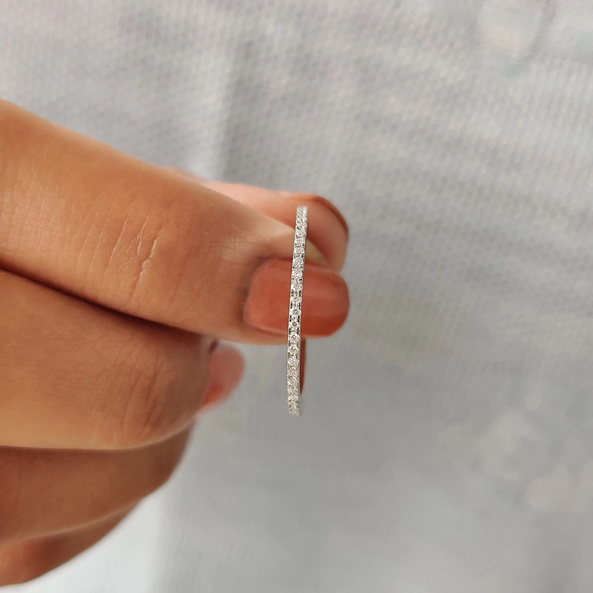 Minimalist Wedding Band with Round Cut Stones - Image 5