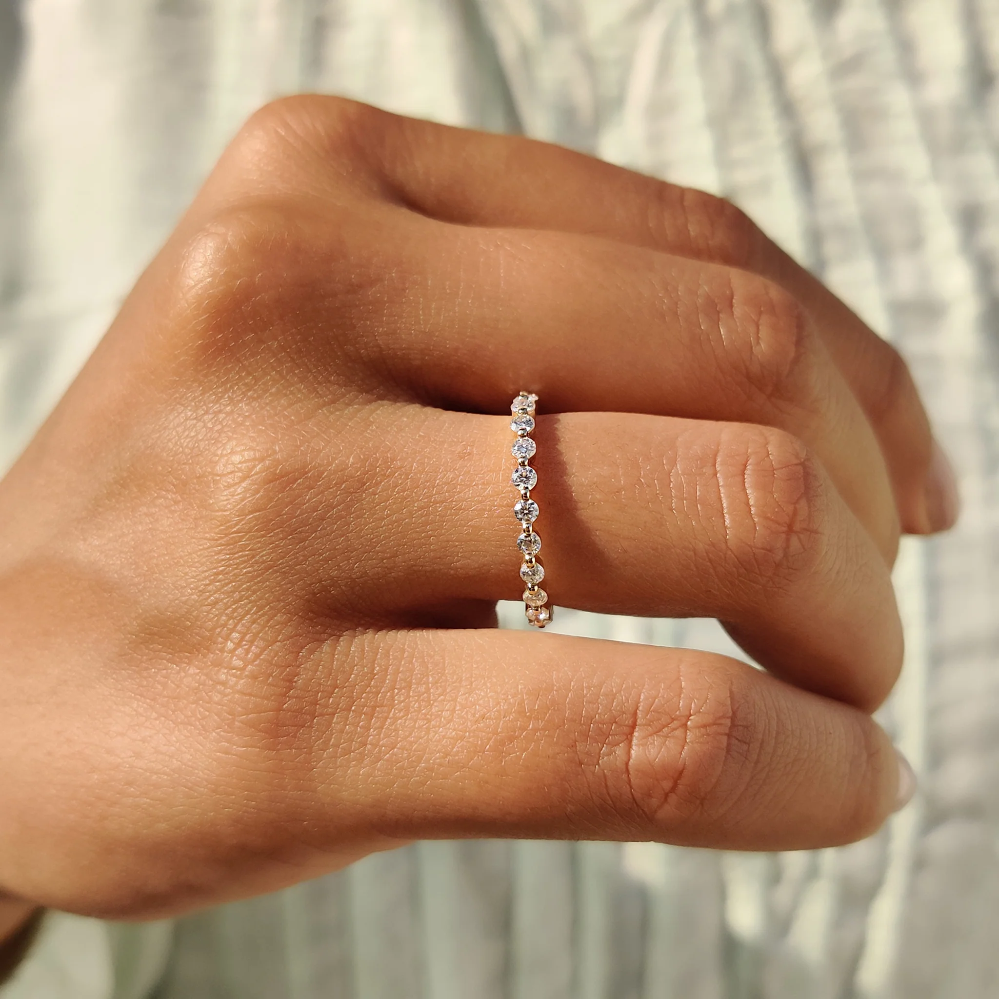 Round Moissanite Yellow Gold Eternity Band - Image 8