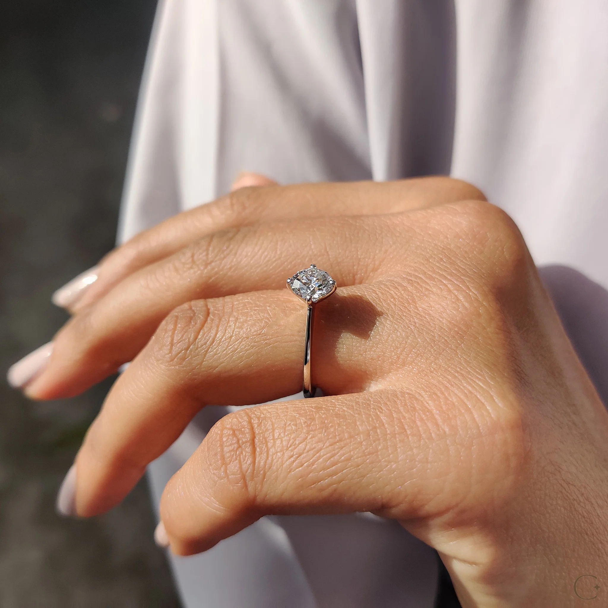Round Solitaire Engagement Ring With Tapered Shank Design - Image 4