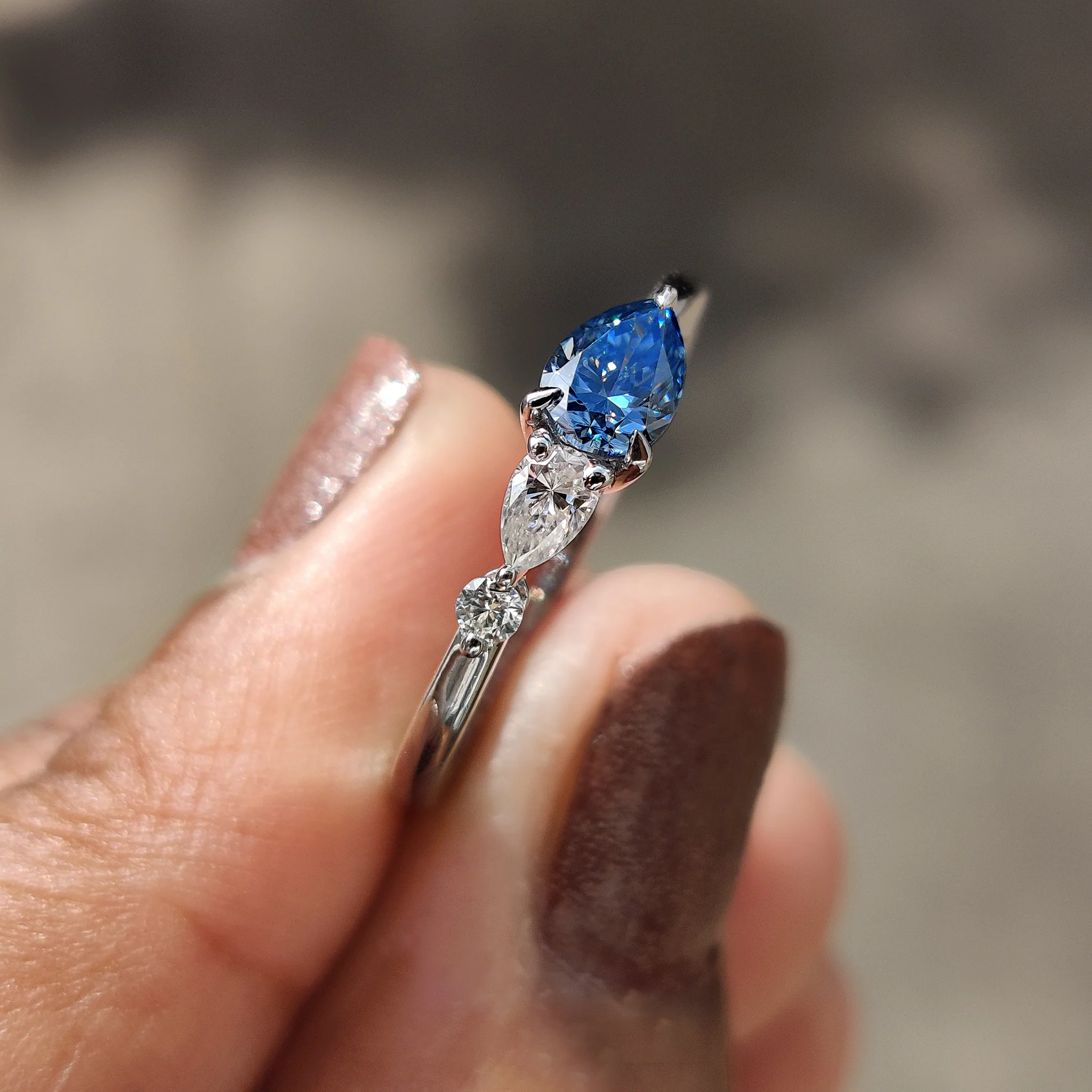 Royal Blue Pear Three Stone Engagement Ring - Image 7