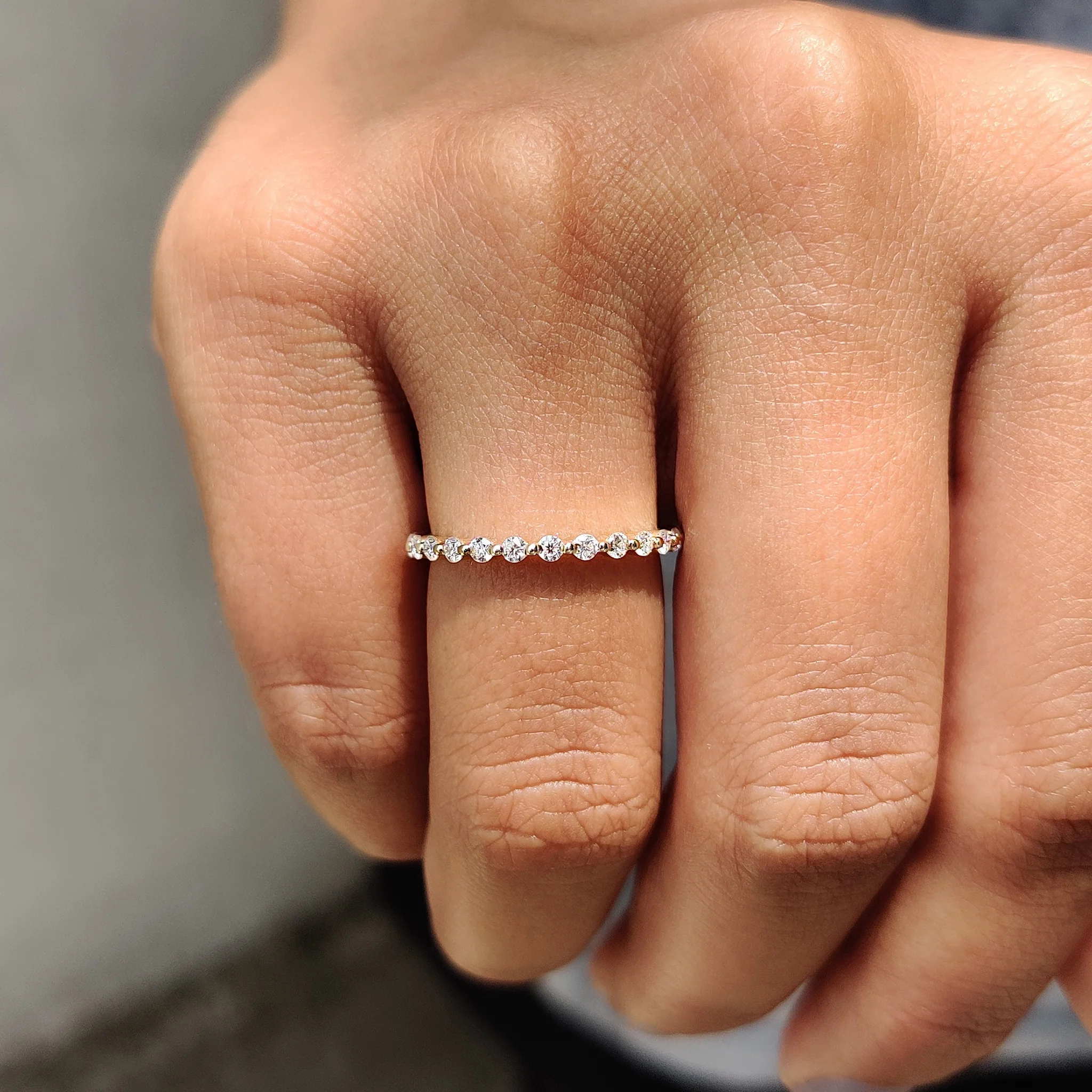 Yellow Gold Eternity Band In Round Cut Moissanite - Image 2